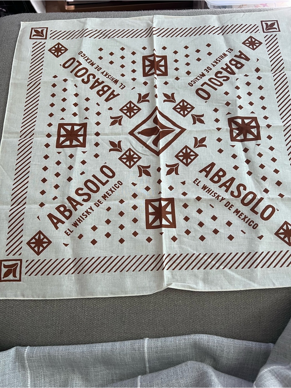 Asolo Cream Bandana Table Linen with Brown Geometric Print